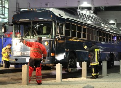 Police remove a bus from outside Frankfurt Airport after a gunman fired on US military personnel on board yesterday.