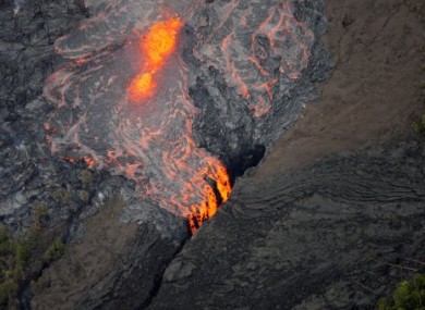 Lava flows from the Pu'u O'p crater on Kilauea yesterday in Hawaii.