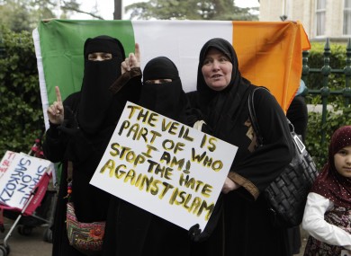 Members of the Irish Arab and Semite Solidarity movement protest outside the French Embassy in Dublin against the recent French ban on religious clothing.