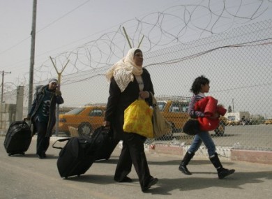 Photo dated 19 February 2011 of Palestinians coming back to Gaza from Egypt at the Rafah crossing.