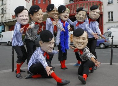 Members of Oxfam international wear G8 leaders masks to demonstrate against this week's summit in France.
