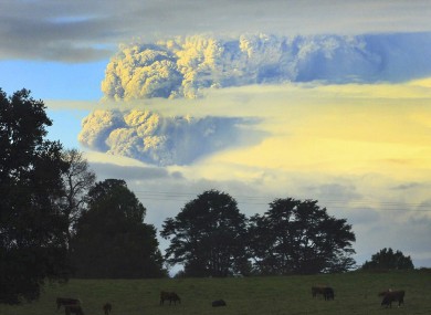 A column of smoke and ashes emerges from a volcano in southern Chile.