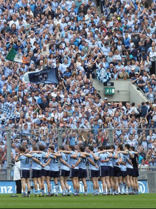The Dublin senior football team sing the national anthem before kick-off at Croke Park.