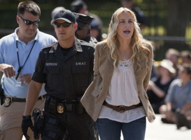 Daryl Hannah being led away in handcuffs from today's protest outside the White House.
