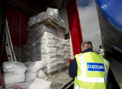 File photo of a Customs officer at a fuel laundering plant.