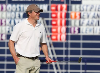 Actor Hugh Grant warms up at the Alfred Dunhill Links Championship on Friday.