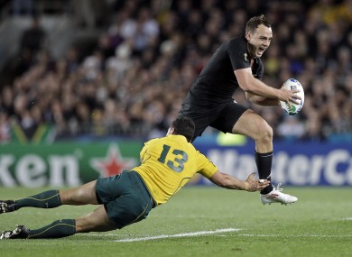 Israel Dagg skips his way past Australia's Anthony Faingaa.