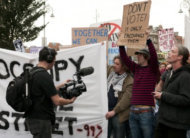 Demonstrators attend the Occupy Dame Street solidarity rally in Dublin today.