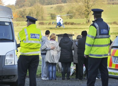 Gardaí and relatives of Ciarán Noonan at the scene his remains were discovered in Co Meath.