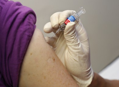 File photo of the seasonal flu vaccine being administered.
