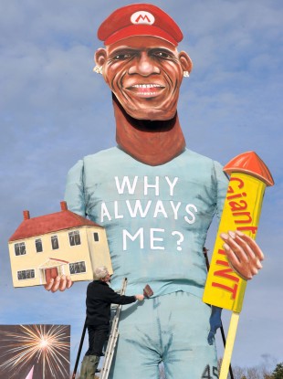Frank Shepherd of the Edenbridge Bonfire Society puts the finishing touches to this year's celebrity guy, a giant effigy of Manchester City striker Mario Balotelli today.