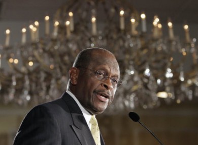 GOP candidate Herman Cain speaking to supporters at a rally on Thursday.