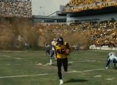 Hines running down the field, which disappears behind him.