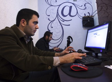 Iranian journalism students use the Internet in a cafe in central Tehran. Iran is expected to launch a national intranet within weeks.