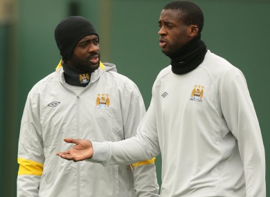 Manchester City's Kolo (left) and Yaya Toure.