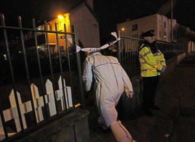 Gardaí forensic teams outside the flat in Kimmage yesterday.