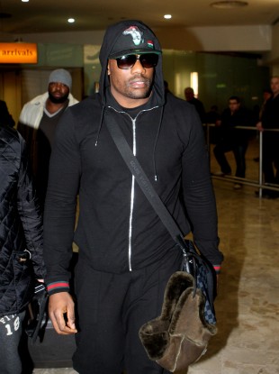 Chisora returning at Heathrow airport yesterday.
