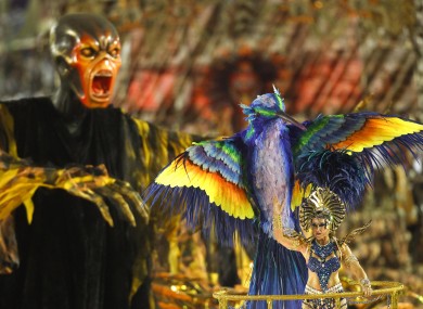 A dancer and floats during today's Carnival celebrations in Rio de Janeiro's Sambadrome.