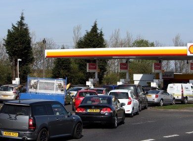 Drivers queue for petrol and diesel at a fuel station in Gateshead in England today