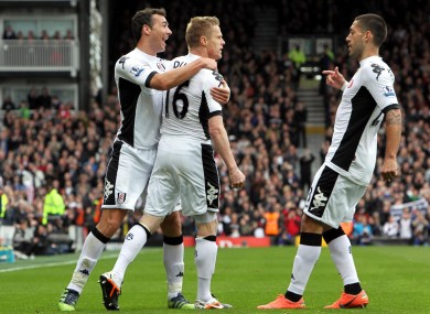 Duff is congratulated by Stephen Kelly (left) and Clint Dempsey.