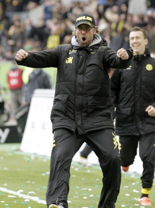 Dortmund coach Juergen Klopp celebrates after his team's 3rd goal last weekend.,