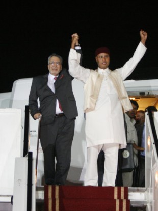 Abdel Basset al-Megrahi greeted by Seif al-Islam Gaddafi at Tripoli airport in 2009.