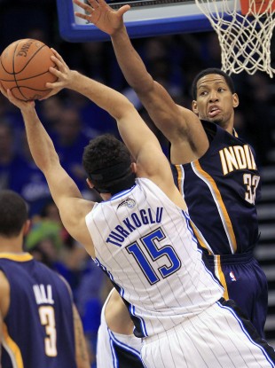 Indiana Pacers' Danny Granger defends a shot by Orlando Magic's Hedo Turkoglu.