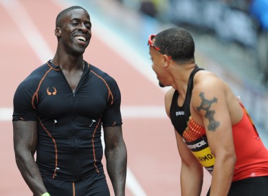 Dwain Chambers (left) and Wallace Spearmon after the Men's 150m event during the Great CityGames on Deansgate, Manchester.
