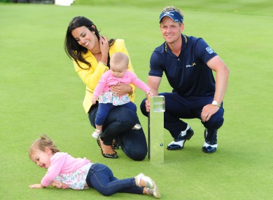 Luke Donald with his wife Diane, and daughters Elle (on floor) and baby Sophia Ann yesterday.