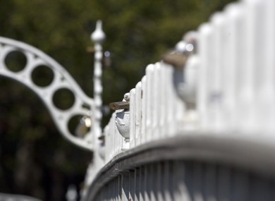 'Love locks' on Dublin's Ha'penny Bridge. The council has asked couples not to add any more as they could damage the structure.