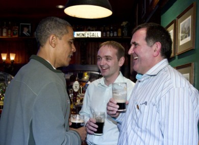 Henry Healy, centre, with Obama and Moneygall pub owner Ollie Hayes.