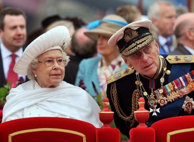 Queen Elizabeth II and the Duke of Edinburgh during the Diamond Jubilee River Pageant on the River Thames in London yesterday.
