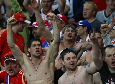 Russian fans celebrate their win yesterday.