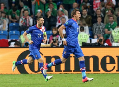 Mandzukic celebrates his second of the night.