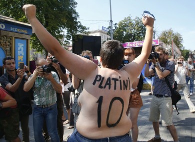 An activist of Ukrainian women movement Femen protests in the Euro 2012 at Fan Zone in Kiev today.