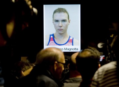 The photograph of Luka Rocco Magnotta,is shown during a news conference in Montreal yesterday