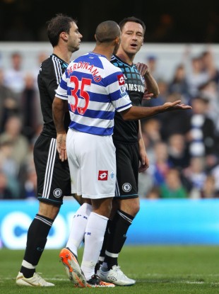 Chelsea captain John Terry (right) speaking with QPR's Anton Ferdinand last October.