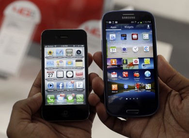The Apple iPhone 4s, left, and the Samsung Galaxy S III.