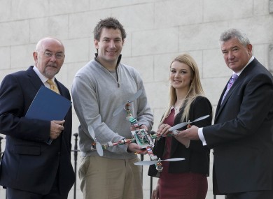 Education minister Ruairí Quinn (left) and Bank of Ireland chief executive Richie Boucher (right) launch the bank's new postgraduate loan scheme, with TCD students Conor McGinn and Jade Pollock.