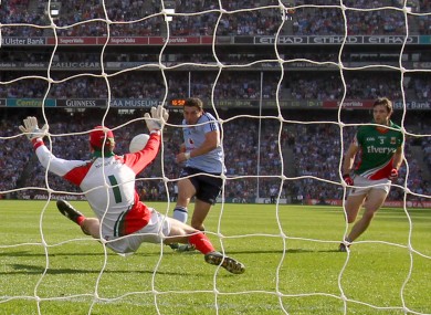 Mayo goalkeeper David Clarke makes a crucial stop from Bernard Brogan late on.