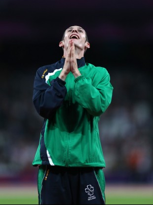 Michael McKillop celebrates on the podium after his 1,500m win last night. Only viewers with Setanta or Channel 4 could watch the race live on TV.