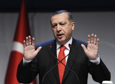Turkey's prime minister Recep Tayyip Erdogan addresses a forum in Istanbul. Turkey and Syria have each banned flights coming from the other country.