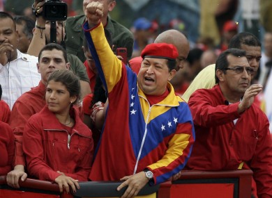 Hugo Chavez waves to a crowd in Caracas earlier this year