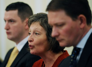 Geraldine Finucane (centre) and her two sons Michael (right) and John (left) at a press conference in Westminster today.