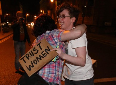 Members of the pro-choice camp celebrate the passing of the Protection of Life During Pregnancy Bill tonight outside Leinster House in the early hours of Friday morning.