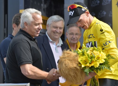 Greg LeMond and Britain's Chris Froome of Team Sky in the yellow jersey yesterday.