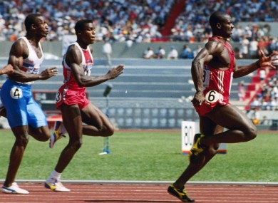 Johnson (right) leads Carl Lewis and Linford Christie at the Seoul Olympics.