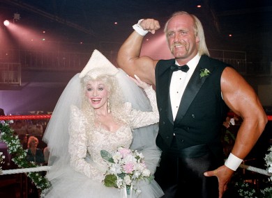 Hulk Hogan (right) with Dolly Parton who is wearing a wedding dress for some reason.
