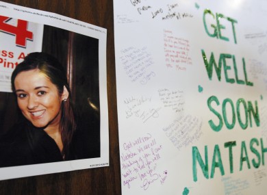 2010 file photo of a 'get well' message posted for Natasha in the Chicago bar where she worked