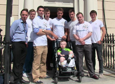 Dominic Ryan (centre) with fellow founders of 100 Minds outside Temple Street Children's Hospital.
